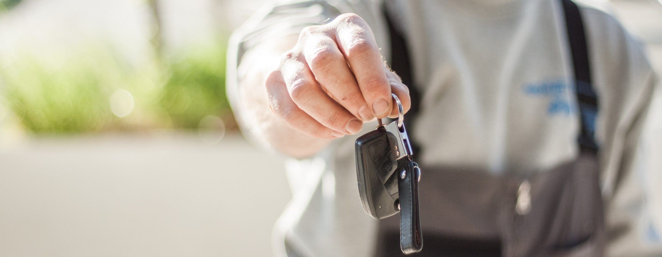 Man handing over keys